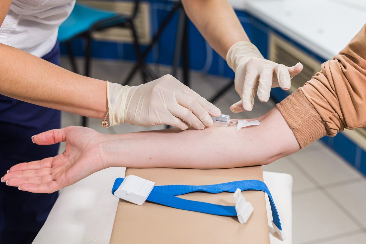 Covid-19, pandemic concept - Close-up of doctor takes blood on the analysis.